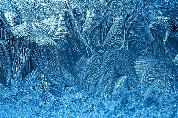 Texturiertes Muster aus weißen Schneeflocken