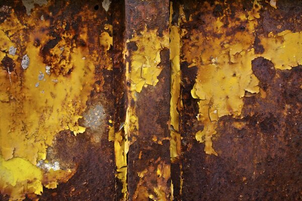 Rust on the wall with layers of paint