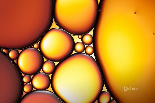 Oil bubbles in the water in the form of balls