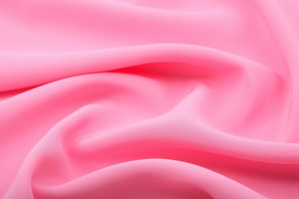 Ажурные изгибы светло-розовой ткани