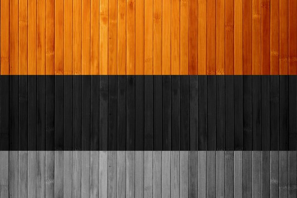 Tricolor de tablas marrones, negras y grises