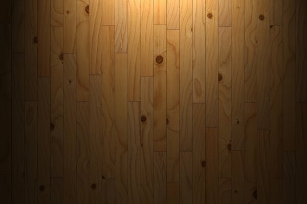 The wooden wall is light in the shade