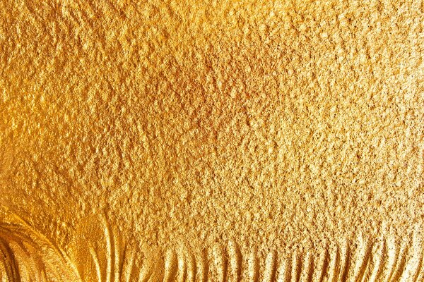 Złoty blask piasku tekstury