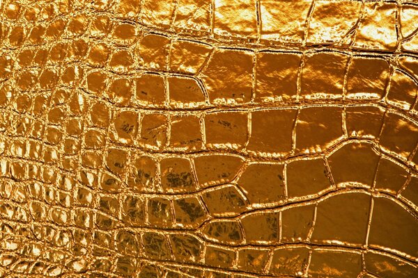 Textura de cuero dorado brillante