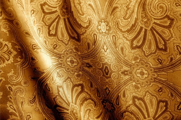 Textured pattern on gold-colored fabric