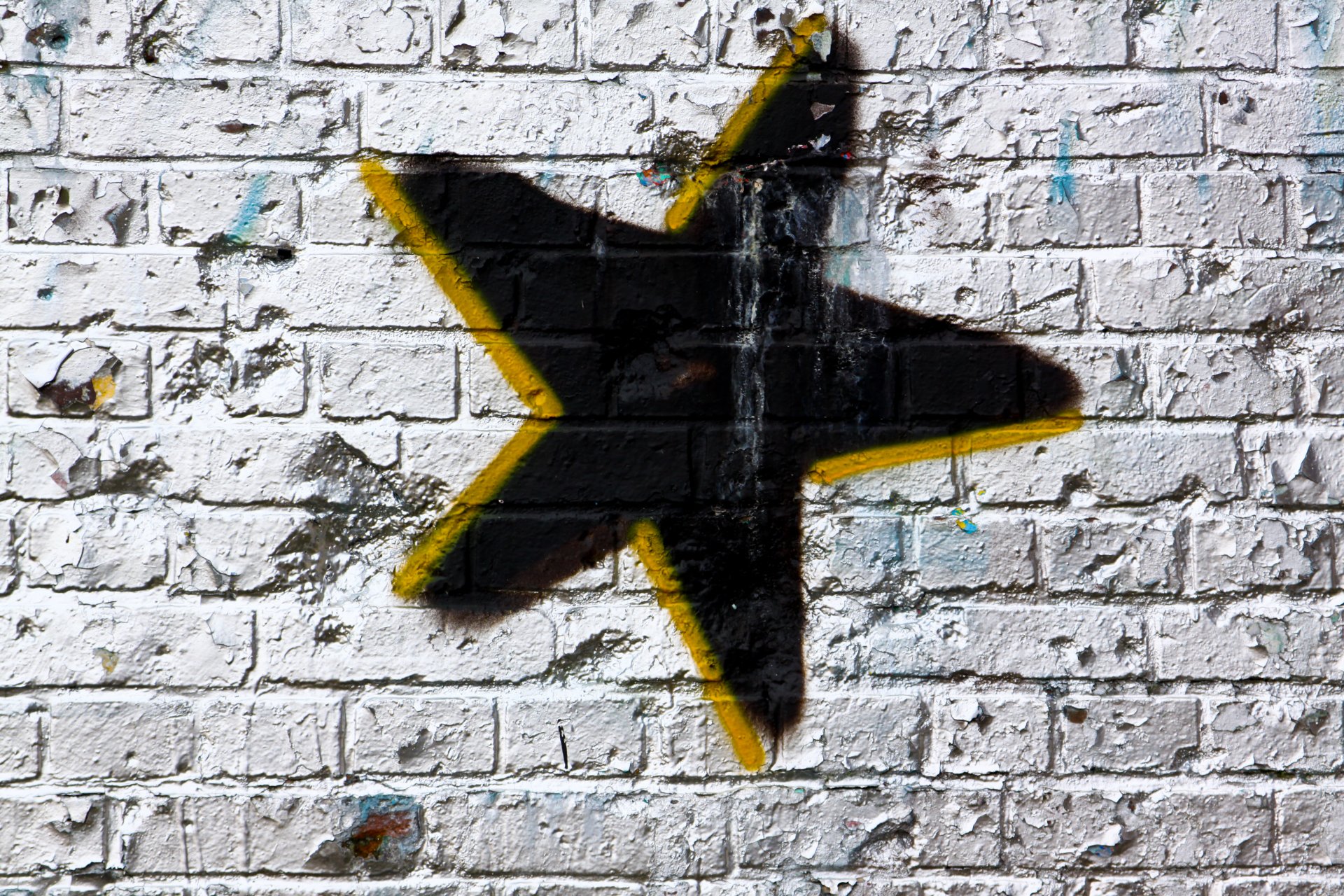 modelo estrella pared pintura en aerosol negro blanco amarillo