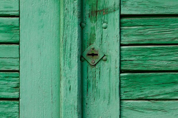 Zamek drzwi. Zielone drzwi