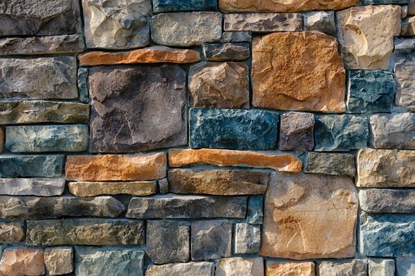 Beau mur de pierre coloré