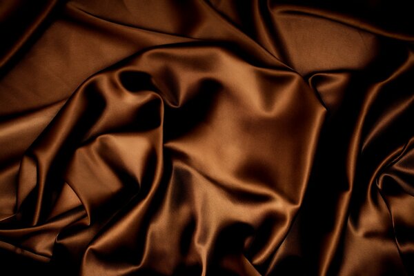 Шоколадный шелк. Коричневый фон из ткани