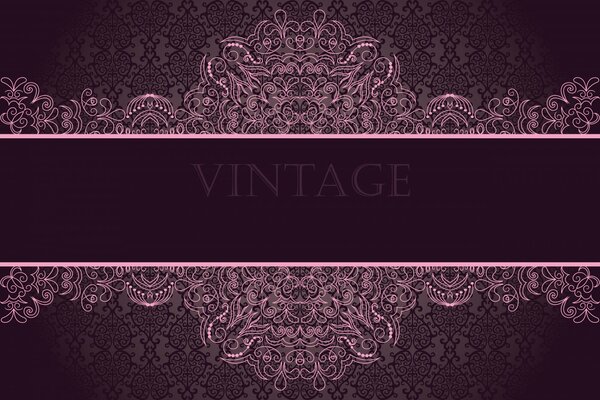 Vintage pink ornament on a dark background