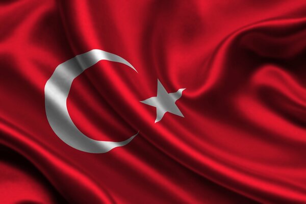 Turkish flag on silk canvas close-up