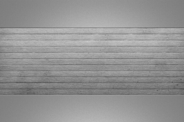 Gray stripes on a smooth gray background