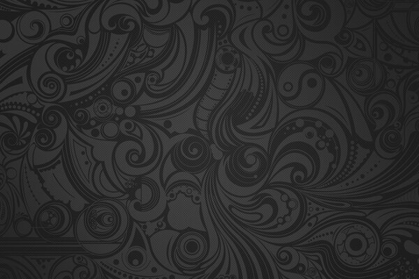 Superficie de textura oscura con símbolos