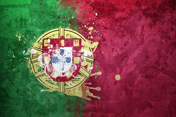 Flaga Portugalii z przedstawionym na niej herbem tej republiki