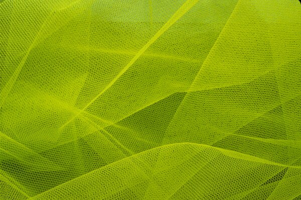 Frühling Textur in Form eines hellgrünen Seidennetzes