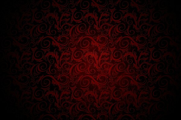 Red ornament on a black background