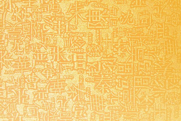 Golden yellow textured hieroglyphs