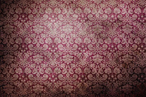 Pink wallpaper on the wall with a pattern