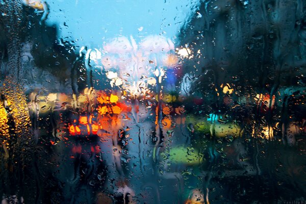 Macro photography of the city in a rainy window