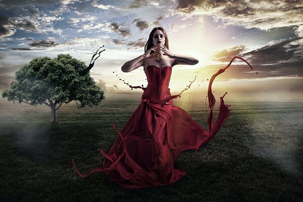 A girl in a red dress conjures