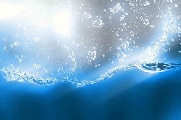 Blue water with a splash of bubbles