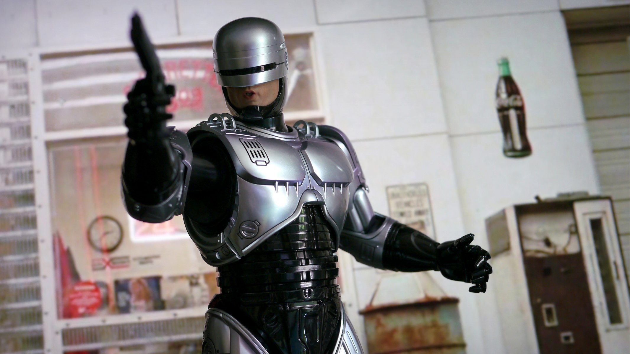 robocop robot cyborg armadura pistola arma fondo