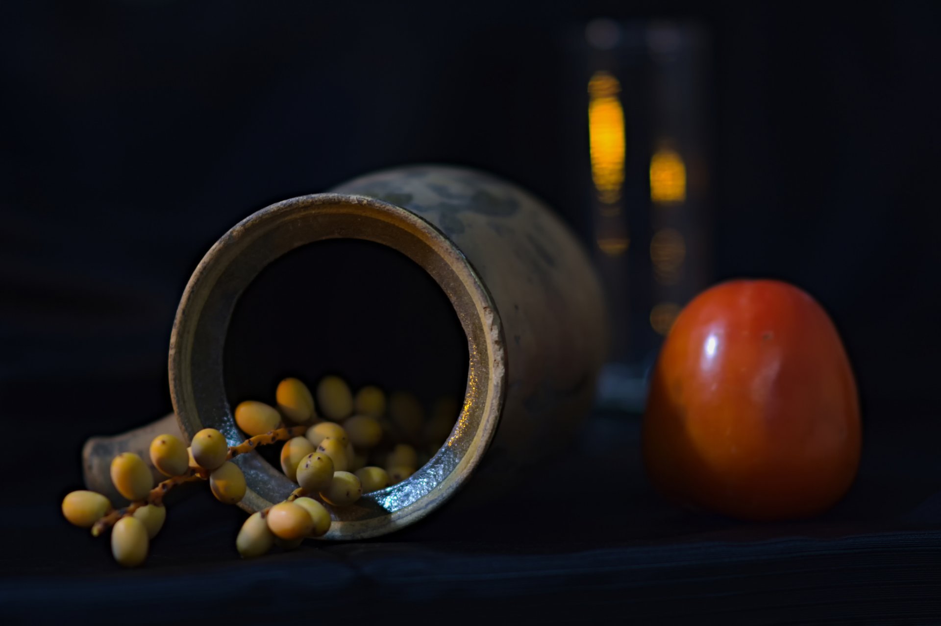 till life pottery and khaki pitcher bokeh composition