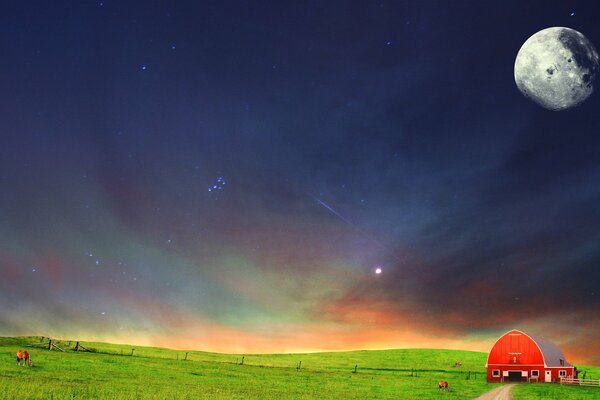 A beautiful picture with the moon and a field