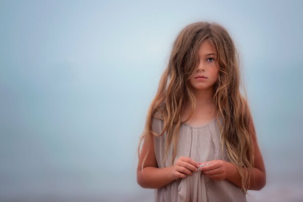 Portrait of a girl Daniele , sky background