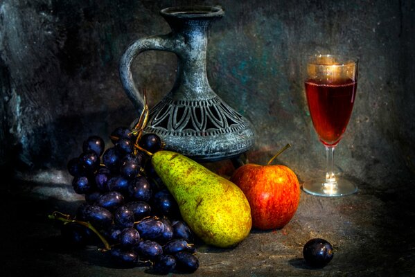 Autumn still life. Jug, wine and fruit