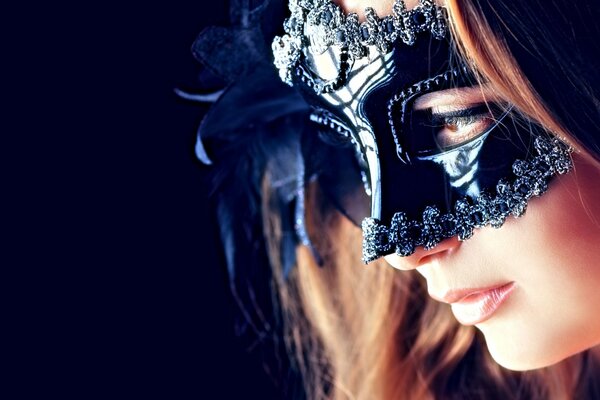 A woman in a sexy mask