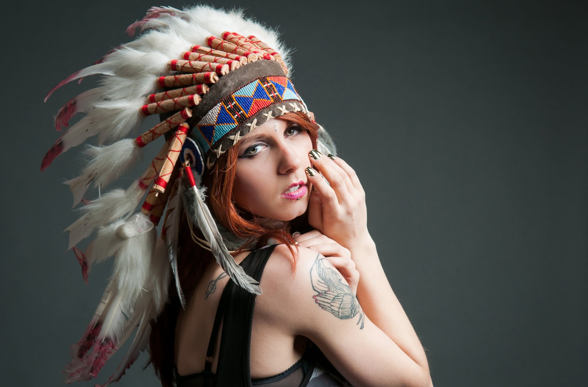 girl face view tattoo headwear feathers background