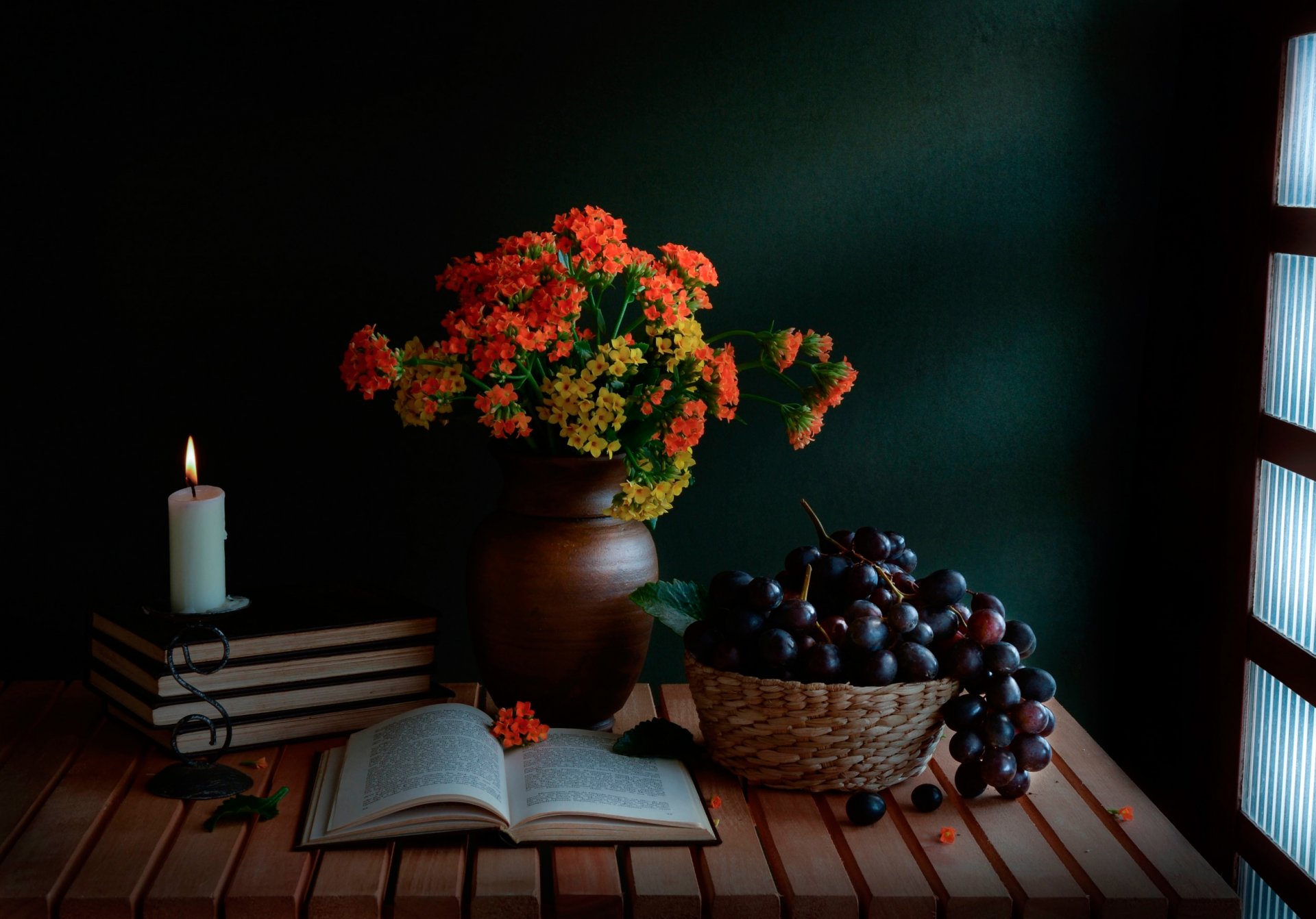 a guiding light bouquet books candle grapes still life