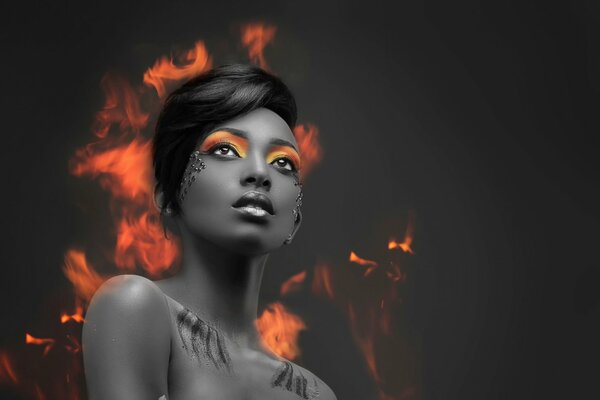 Portrait of a girl with bright shadows in flames