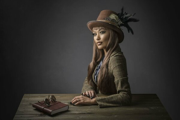 Ragazza con un cappello steampunk