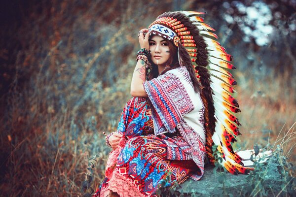 A girl in an Indian headdress