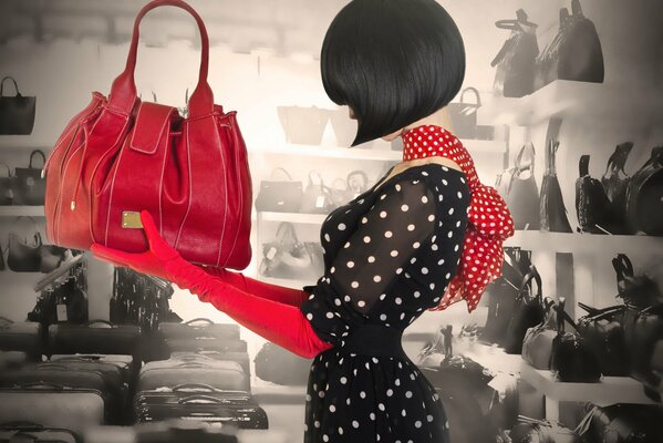 Klasyczny styl: czarna sukienka w białe kropki, czerwona torba i rękawiczki, bob cut