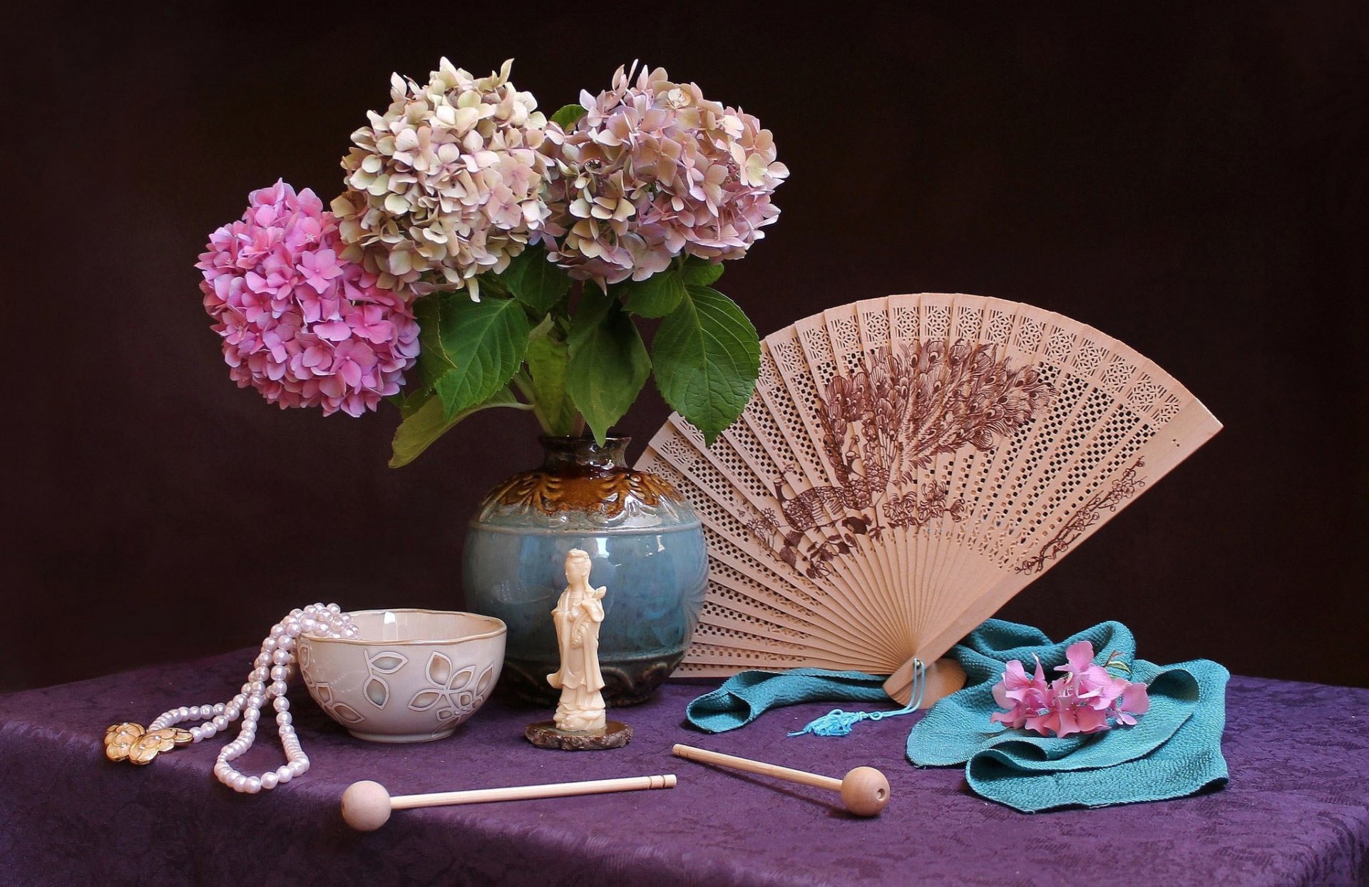 lilac vase fan statue bowl beads clips cloth petals table background