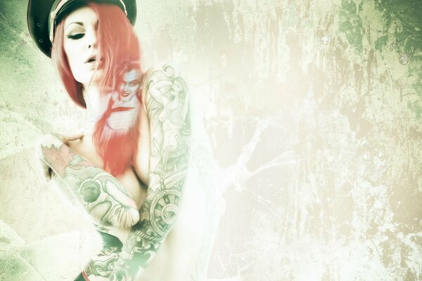 Girl with tattoos on a blurry background