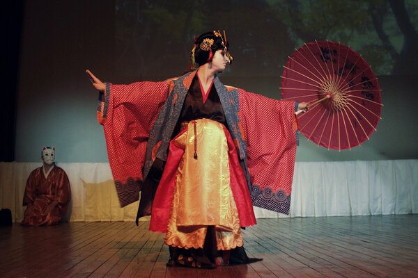 Cosplay for a masked geisha and a cat