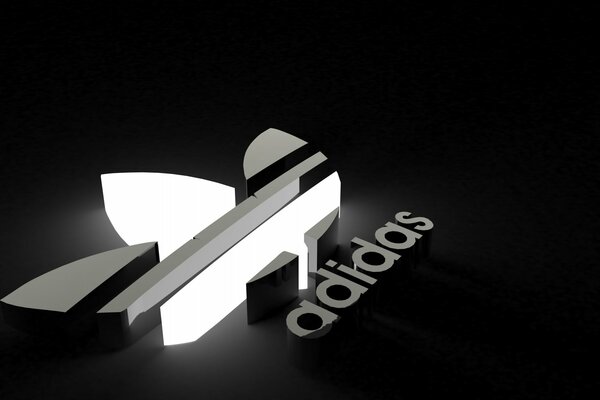 Logotipo de la marca deportiva Adidas sobre fondo negro