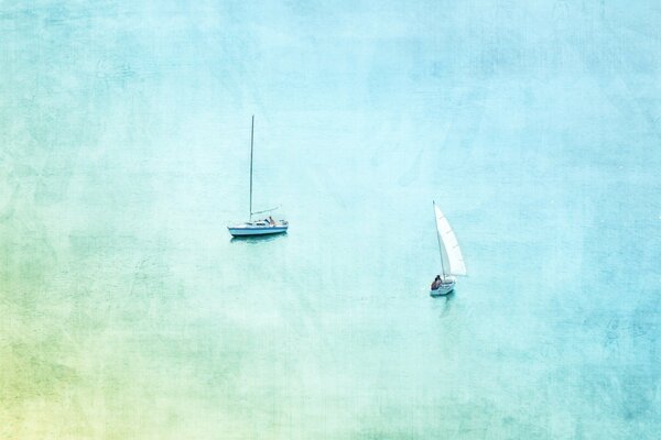 Paysage marin avec deux yachts