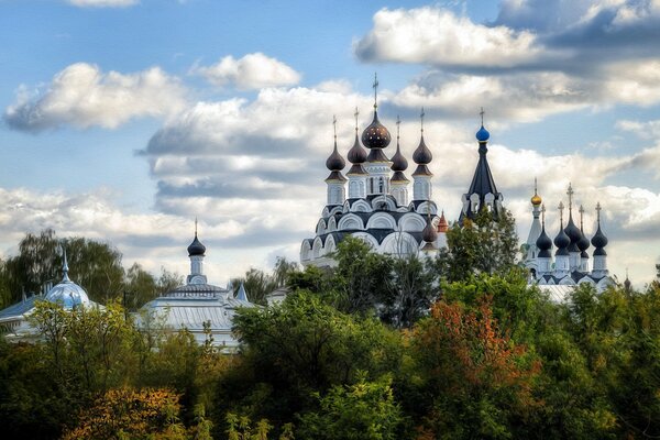 Annunciation and Trinity monasteries against a cloudy sky