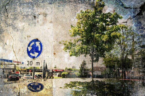 An ancient image of the city. Gas station and trees