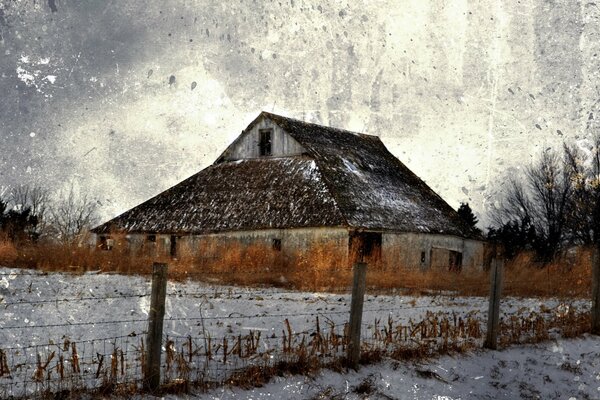 A house in a snow-covered field