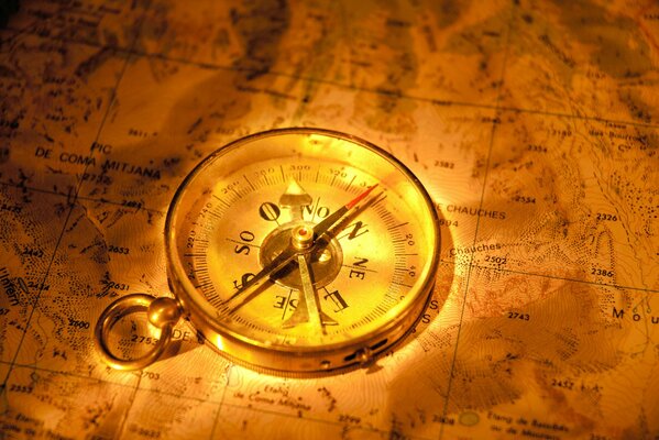 Map compass on the table