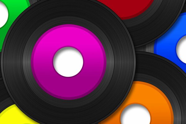 Colored vinyl records on a white background