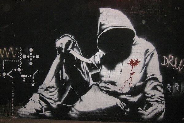 Banksy Sweatshirt auf Street Graffiti