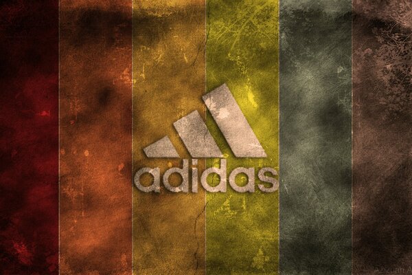 Emblema Adidas su strisce colorate