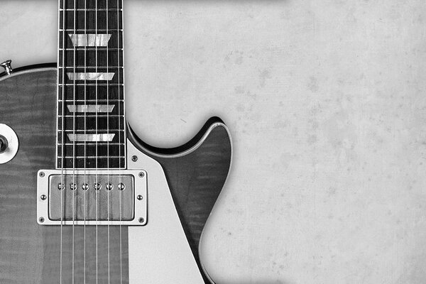 Guitare électrique élégante sur fond noir et blanc